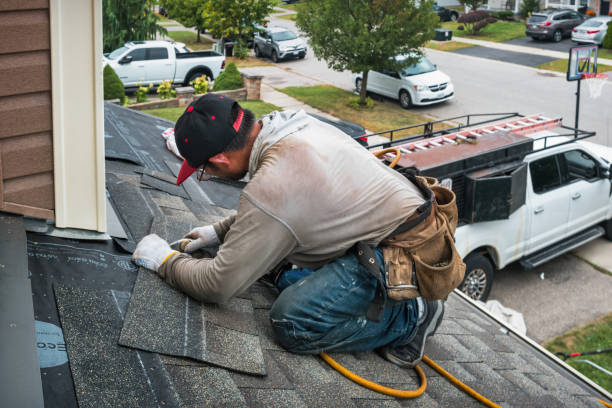 Professional Emergency Roof Repair technician working in Harrison, MI